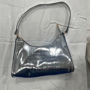 silver metallic hand bag